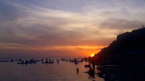 People on the beach at sunset Stock Footage 35651170