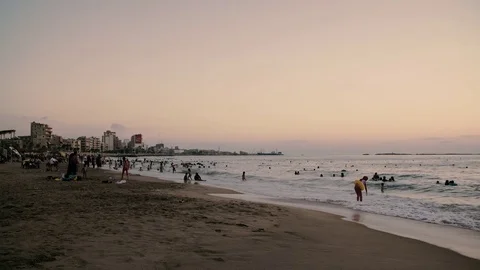 People at the beach, Sunset Video stock 79226864