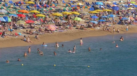 People at the beach in Tossa de Mar, Spain Stock-Footage 67396504