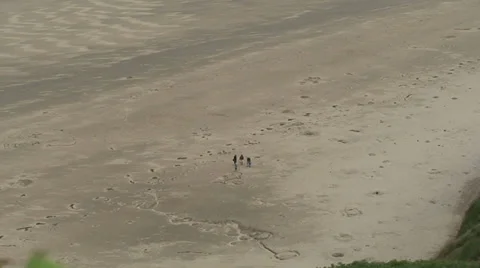 People on a Beach in Wales Stock Footage 34408129