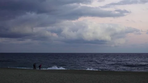 People at the beach in winter Video stock 73176321