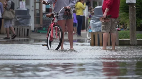 People being evacuated from flood Stock Footage 67477739