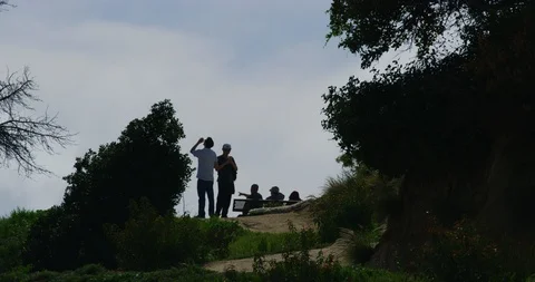 People at a bench in Griffith Park. Los Angeles, California Stock Footage 115099159