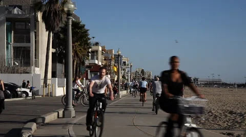 People on a bike path at Santa Monica Pier Stock Footage 59335387