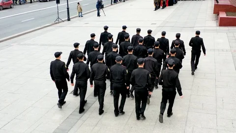 People in black uniform Stock-Footage 107872382