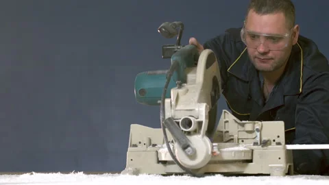 People on Blue Background is Working Tree and Chips are Flying out of 4K Machine Stock Footage 93849526