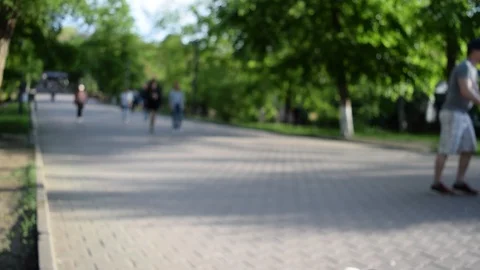 People on a blurred background are walking on the cobblestones Stock Footage 109495089