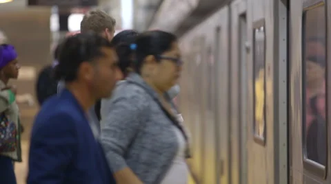 People board underground subway train Stock Footage 44266737