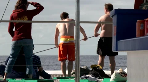People on a boat deck sailing in Atlantic Ocean. Stock Footage 48802934