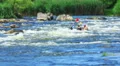 People in boat on river have a fan. Rafting team HD Footage