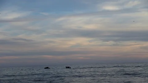 People boating in the distance Stock Footage 83164500