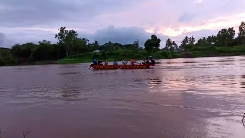 People boating on Krishna river during evening sunset and during flood. Stock Footage 138322833