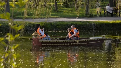 People boating in Lake Stock Footage 77479813