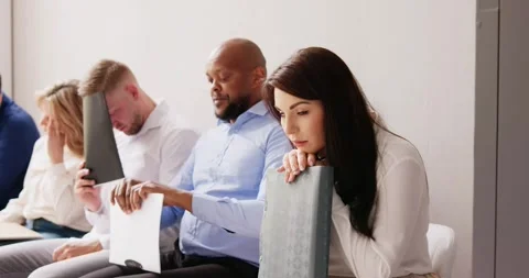 People Bored While Sitting On Chair Waiting For Job Interview Stock Footage 240850608