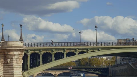 People on a bridge in Paris Stock Footage 128198332