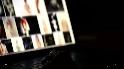 People browsing internet content about nude woman, focus on hand. Stock Footage 60045981