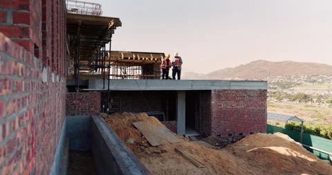 People, building and construction workers outdoor on site with planning for Stock Footage 336225464