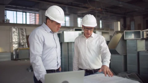 People, building, construction, architecture concept - male architect or builder Stock Footage 85874772