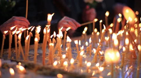 People burning candles Stock Footage 43633941