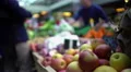 People buying fruit at local food market, healthy eating, seasonal shopping HD Footage