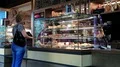 People in cafe with confectionery in Poltava city, Ukraine HD Footage
