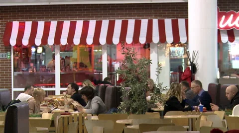 The people in the cafe talking and drinking coffee. Stock Footage 61344198