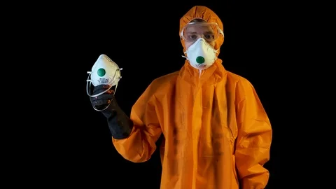 People can be infected with a deadly coronavirus study, close-up. jumpsuit Stock Footage 124530587