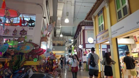 People can be seen exploring and shopping around the Central Market. Stockbeeldmateriaal 319454220