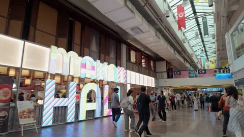 People can be seen exploring and shopping around the Central Market. Stockbeeldmateriaal 320853341