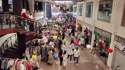 People can seen exploring and shopping around the Central Market. 動画素材 200457592