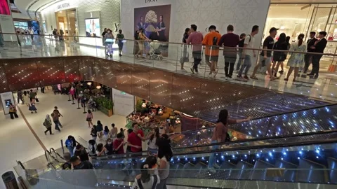 People can seen exploring around The Exchange TRX mall. 動画素材 263963705
