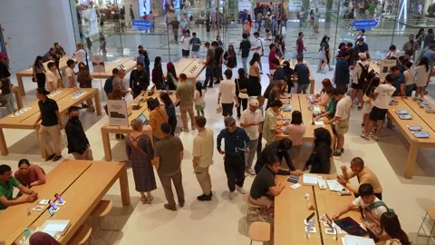 People can seen exploring around Apple The Exchange TRX. Stock Footage 283448423