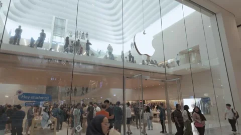 People can seen exploring around Apple The Exchange TRX. 動画素材 283450945