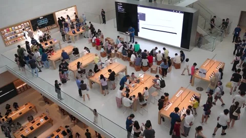 People can seen exploring around Apple The Exchange TRX. Stock Footage 283451048
