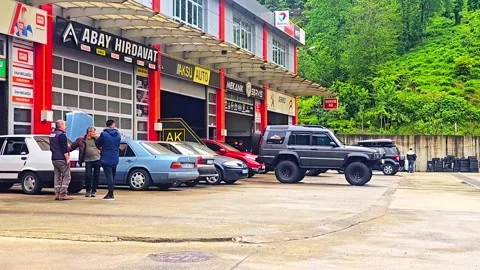People in the car shop Stock Footage 277174591