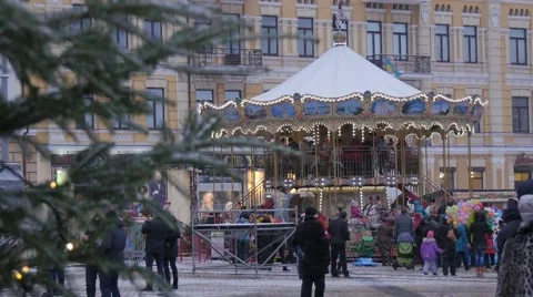 People on Carousel Woman Selling a Balloons Kids Families Spend the Time on a Stock Footage 59132065