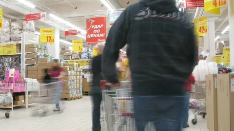 People with carts in a supermarket Ashan in Moscow, Russia. Stock Footage