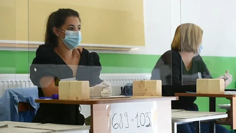 People casting their votes during local elections in Bucharest Video stock 139973572