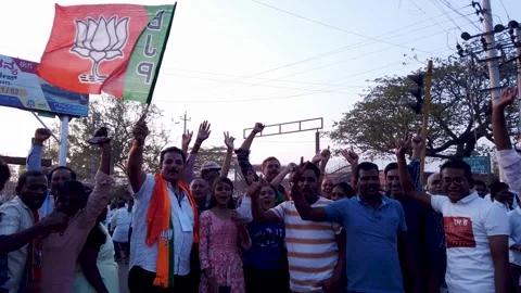 People celebrating Indian Election 2024 poll rally in Mysuru, India. Stock Footage 272554553