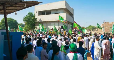 People celebrating jashan e eid milad un nabi  rally in a local village. Stock Photos