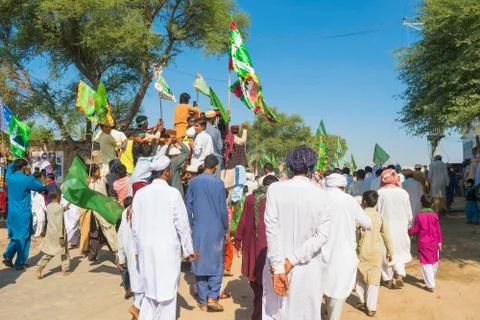 People celebrating jashan e eid milad un nabi  rally in a local village. Stock Photos