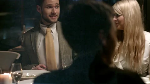 People chatting at a restaurant. Stock Footage 61158024