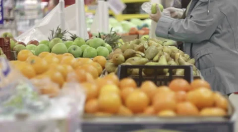 People choose fruit in store. Stock Footage 50099669