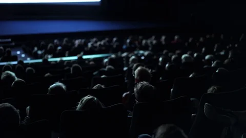 People in a cinema - film performance in a movie theater Stock Footage