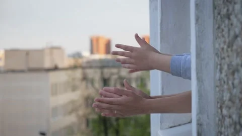 People Clap Hands From Windows To Support Those Who Struggling With Coronavirus Video stock 130560970