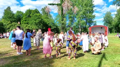 The people clap their hands from side to side and then stomp their feet rapidly Stock Footage 315087745