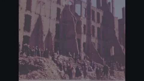 People clean the remains around the ruined buildings- 1945 Stock Footage 99788024