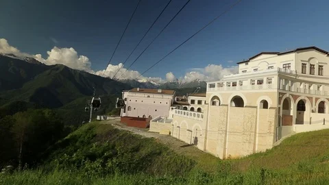 People climb the mountains by cable car Stock Footage 73364436