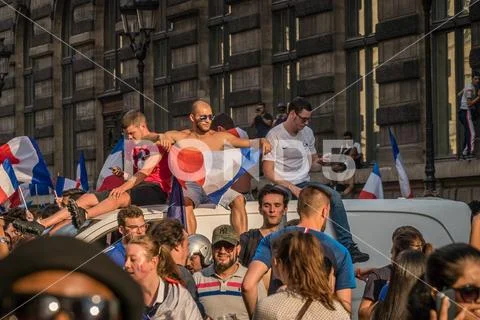 People climbing on cars in France after the 2018 World Cup Final Game Stock Photos