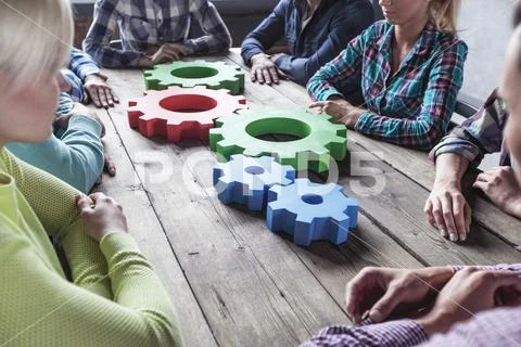 People with cogs of business Stock Photos